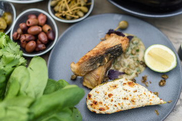 Fried Sturgeon Fish with Cheesy Baked Courgette and Caper Sauce