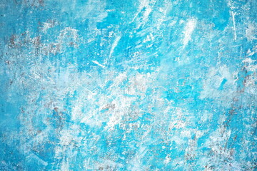 Old blue scratched wall as wallpaper