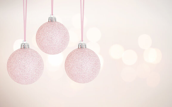 Hanging Pink Christmas Ornament and Defocused Lights Background stock photo