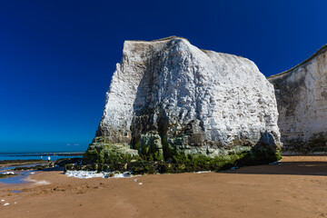 MARGATE, Kent, UK: 21 May 2020: Visitors to Margate's Main Sands beach surrounded by white cliffs during the heatwave in Britain.