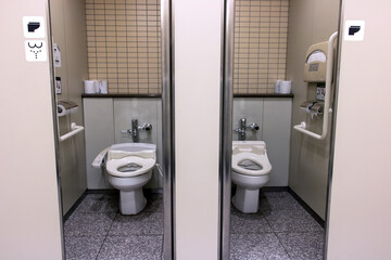 A public toilet bowls with electronic control bidet, Japan.