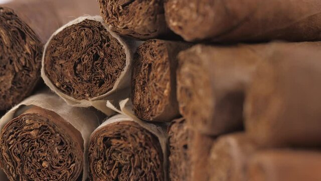 handrolled cuban cigars on white background 4k