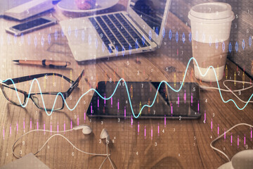 Double exposure of forex chart drawing and cell phone background. Concept of financial trading