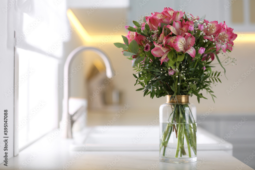 Canvas Prints Vase with beautiful alstroemeria on countertop in kitchen, space for text. Interior design