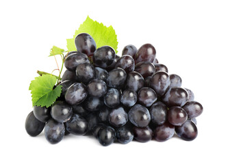 Bunch of fresh ripe juicy dark blue grapes with leaves isolated on white