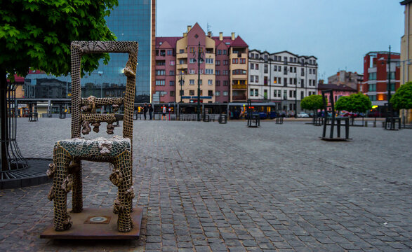 Monument of chairs decorated in Ghetto Heroes' Square in Warsaw Ghetto, Poland. Built in memory of the victims taken to the nazi concentration camp.