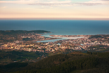 Fototapeta premium Look at Bidasoa-Txingudi bay with the three cities that formed it: Irun, Hondarribia and Hendaia, at the Basque Country. 