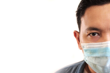 Man wearing protective facial mask. Nwe normal concept. Close up head shot portrait isolated on white