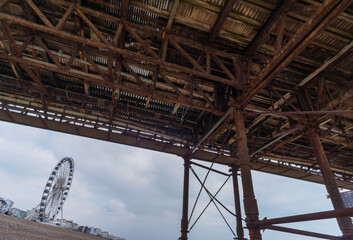 Underneath Brighton Pier and structural details,in late winter,Brighton,East Sussex,England,United Kingdom.