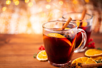 German tradition winter Christmas market new year holidays festival drink tea Gluhwein Mulled sweet hot warm red Wine with spices citrus aromatic cinnamon star anise