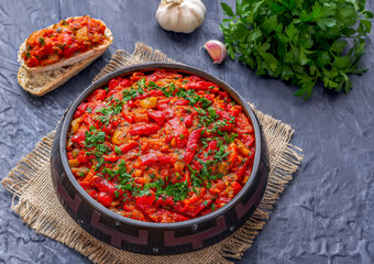 Maghreb cuisine. Vegetable dish Taktouka made of bell peppers and tomatoes. Traditional moroccan...