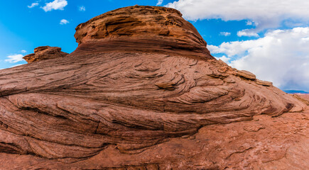 Swirling Patterns on Slick Rock at The New Wave, Glen Canyon National Recreation Area, Arizona, USA