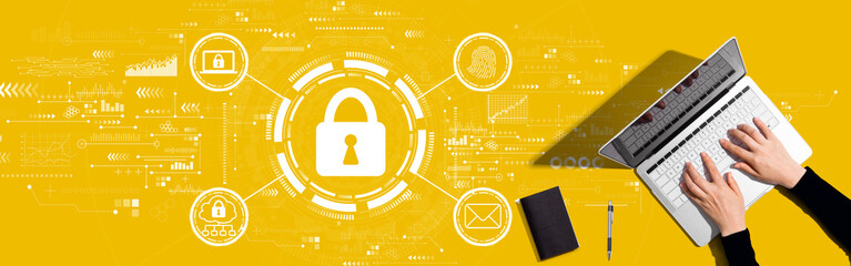 Internet network security concept with person working with a laptop