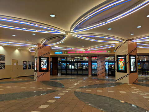 Entrance to Movie Theater Regal Dole Cannery IMAX & RPX with movie posters on display