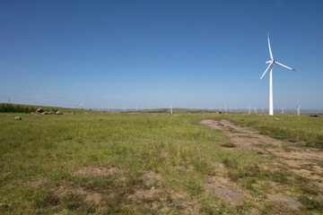 Windmills for generating electricity on the grasslands of Zhangbei County, China - obrazy, fototapety, plakaty
