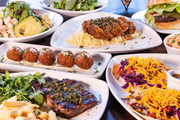 Large variety of choices of tasty plates of food from the Bistro served buffet style on the table