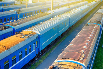 Top View of Standard Blue Railway Carriages At Station Platforms At Daytime.
