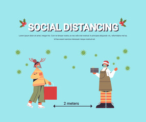 Fototapeta premium girls in masks keeping social distance to prevent coronavirus pandemic new year christmas holidays celebration concept full length horizontal copy space vector illustration