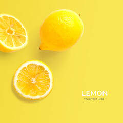 Creative layout made of lemon on the yellow background. Flat lay. Food concept. Macro  concept.