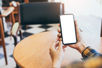 cell phone blank white screen mockup.woman hand holding texting using mobile on desk at office.background empty space for advertise.work people contact marketing business,technology