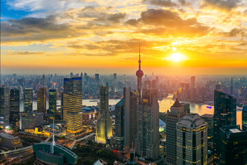 Fototapeta premium Aerial view of Shanghai skyline and cityscape at sunset,China.