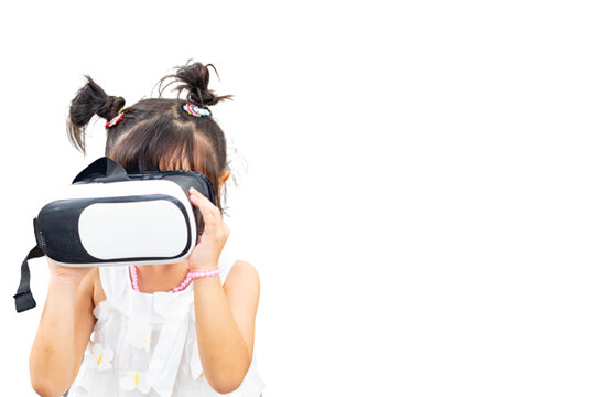 Selective focus.Child girl wear white dress beautiful is playing joystick virtual reality video vr game cyberspace entertainment technology 3d business innovation future digital simulation education 