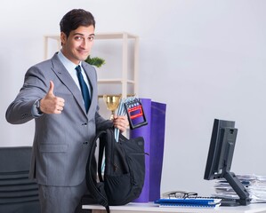 Young businessman rushing to sports gym during break