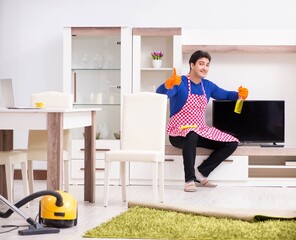 Contractor man cleaning house doing chores