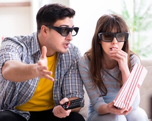 Pair watching 3d movie at home