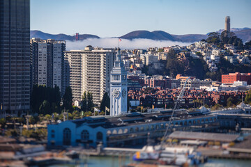 Aerial vibrant view of San Francisco port, with clock tower and the Ferry Building Marketplace,...