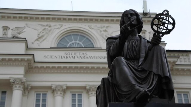 Copernicus Statue In Warsaw Poland On Cloudy Day
