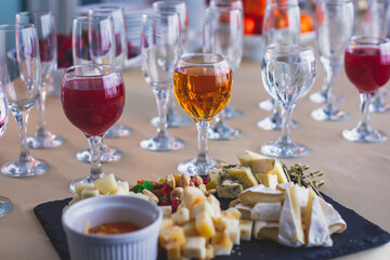 Beautifully decorated catering banquet table with different food snacks and appetizers on corporate christmas birthday party event or wedding celebration