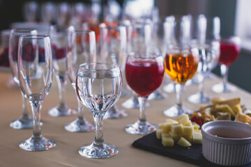 Beautifully decorated catering banquet table with different food snacks and appetizers on corporate christmas birthday party event or wedding celebration