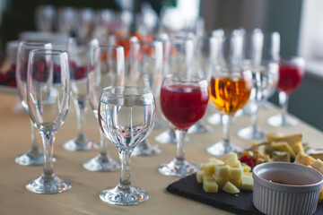 Beautifully decorated catering banquet table with different food snacks and appetizers on corporate christmas birthday party event or wedding celebration