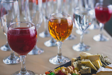 Beautifully decorated catering banquet table with different food snacks and appetizers on corporate christmas birthday party event or wedding celebration
