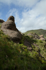 Fototapeta premium The Moon valley. Panorama view of the mountains, green forest and rock formations called Los Terrones, in Cordoba, Argentina.