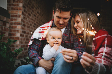 Family Celebrating at Home with Sparklers