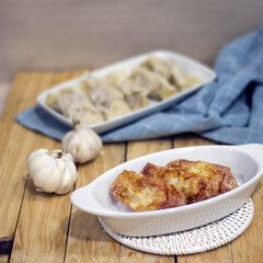 Dumplings in the plate on the table