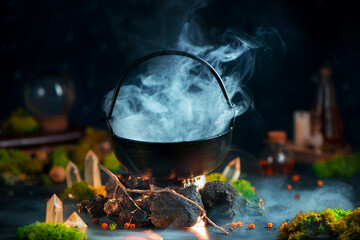 Dense steam above a cauldron, magical still life with smoke, fantasy header