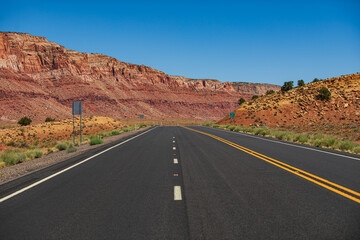 Empty asphalt road. Road in mountains, Travel concept and American roadtrip. Empty asphalt highway.