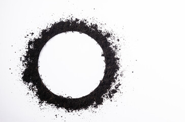 Round circle frame of black land for plant background, Top view of fresh soil with mulch for...
