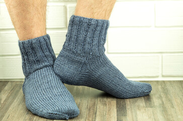Handmade socks, warm and do-it-yourself knitted socks close-up