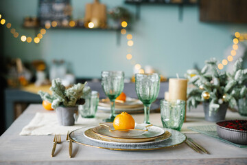 Table served for Christmas dinner in living room