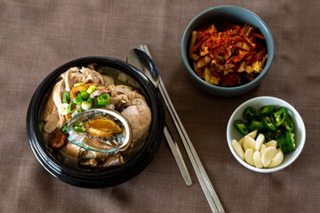 Ginseng chicken soup with abalone which is called Jeonbok Samgyetang