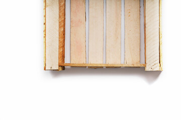 Empty Wooden box for vegetables and fruits on a white background.