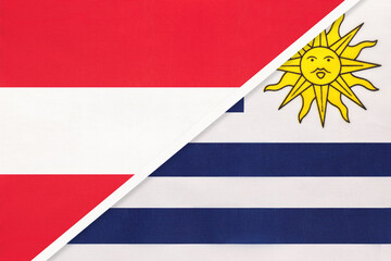 Fototapeta premium Austria and Uruguay, symbol of national flags from textile.
