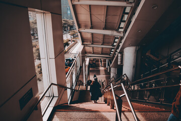 person walking down the stairs