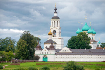 Fototapeta na wymiar View of the Tolgsky monastery. The Holy Gates with the Nikolskaya Church, the Cathedral of the Presentation of the Most Holy Theotokos in the Temple, the bell tower