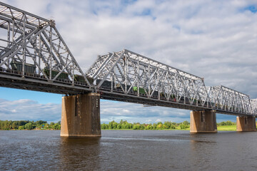 Fototapeta premium Nikolaevsky (Romanovsky) railway bridge across the Volga river in the city of Yaroslavl