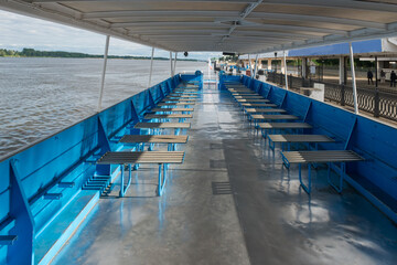 Empty passenger seats on a pleasure boat on a summer day